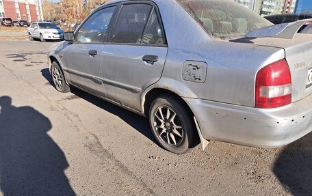Mazda 323, 1999 год, 310 000 рублей, 4 фотография