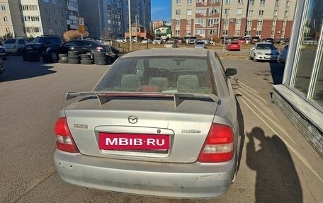 Mazda 323, 1999 год, 310 000 рублей, 8 фотография