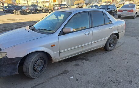 Mazda 323, 1999 год, 310 000 рублей, 12 фотография