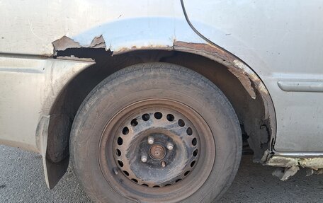 Mazda 323, 1999 год, 310 000 рублей, 14 фотография