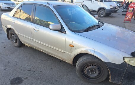 Mazda 323, 1999 год, 310 000 рублей, 15 фотография