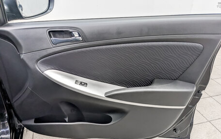 Hyundai Solaris II рестайлинг, 2011 год, 870 000 рублей, 23 фотография