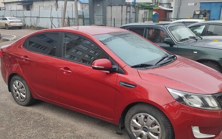 KIA Rio III рестайлинг, 2012 год, 999 999 рублей, 2 фотография