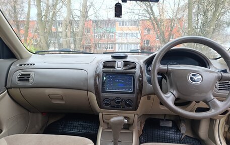 Mazda Familia, 2003 год, 300 000 рублей, 8 фотография