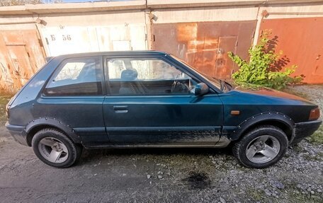 Mazda 323, 1994 год, 230 000 рублей, 9 фотография