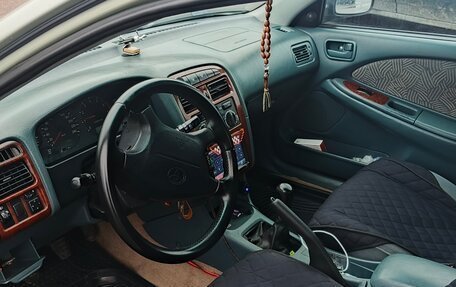 Toyota Avensis III рестайлинг, 1998 год, 360 000 рублей, 8 фотография