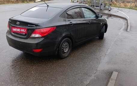 Hyundai Solaris II рестайлинг, 2011 год, 650 000 рублей, 9 фотография