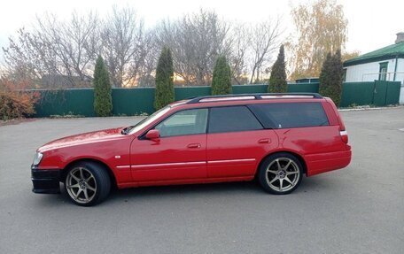 Nissan Stagea II, 2000 год, 590 000 рублей, 21 фотография