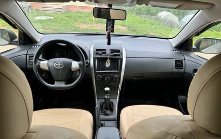 Toyota Corolla, 2011 год, 1 050 000 рублей, 10 фотография