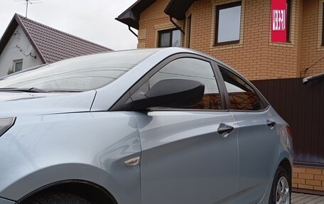 Hyundai Solaris II рестайлинг, 2011 год, 595 000 рублей, 10 фотография