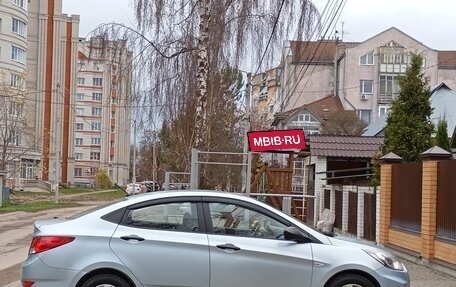 Hyundai Solaris II рестайлинг, 2011 год, 595 000 рублей, 6 фотография