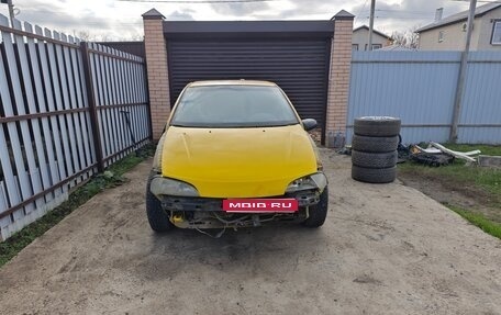 Opel Tigra, 1997 год, 80 000 рублей, 1 фотография