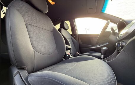 Hyundai Solaris II рестайлинг, 2011 год, 700 000 рублей, 21 фотография