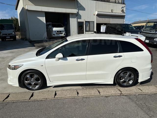 Honda Stream II рестайлинг, 2009 год, 880 000 рублей, 3 фотография