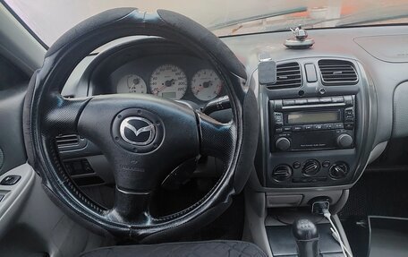 Mazda 323, 2002 год, 63 000 рублей, 5 фотография