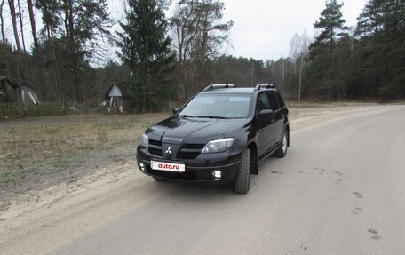 Mitsubishi Outlander III рестайлинг 3, 2004 год, 605 000 рублей, 2 фотография