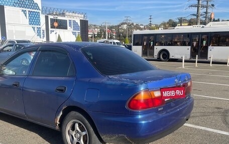 Mazda 323, 1995 год, 75 000 рублей, 3 фотография