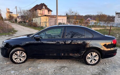 Volkswagen Jetta VI, 2013 год, 800 000 рублей, 3 фотография