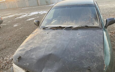 Mitsubishi Carisma I, 1997 год, 90 000 рублей, 1 фотография