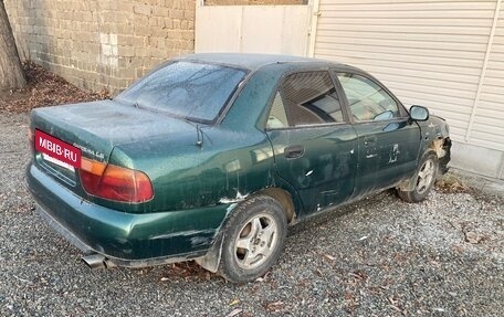 Mitsubishi Carisma I, 1997 год, 90 000 рублей, 5 фотография