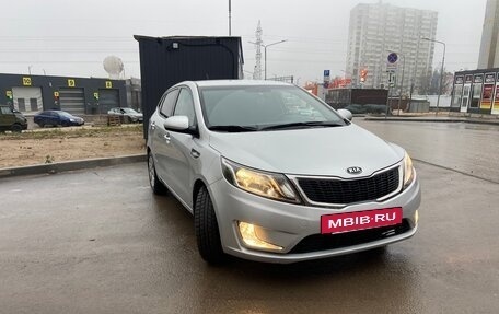 KIA Rio III рестайлинг, 2012 год, 670 000 рублей, 3 фотография