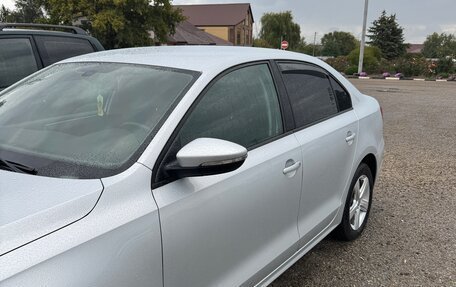 Volkswagen Jetta VI, 2013 год, 1 170 000 рублей, 2 фотография