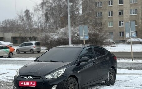 Hyundai Solaris II рестайлинг, 2011 год, 690 000 рублей, 3 фотография