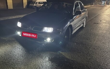 Mitsubishi Carisma I, 2002 год, 270 000 рублей, 12 фотография