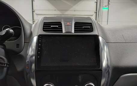 Suzuki SX4 II рестайлинг, 2011 год, 850 000 рублей, 19 фотография