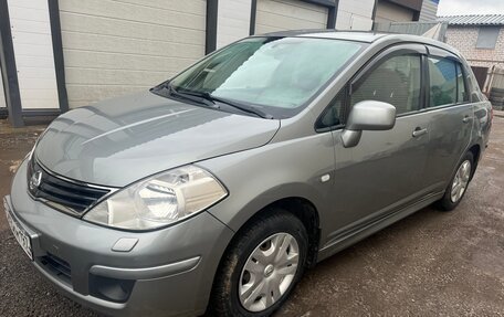 Nissan Tiida, 2010 год, 677 777 рублей, 2 фотография