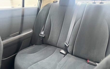 Nissan Tiida, 2010 год, 677 777 рублей, 10 фотография