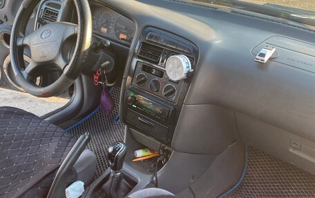 Toyota Avensis III рестайлинг, 1998 год, 350 000 рублей, 13 фотография