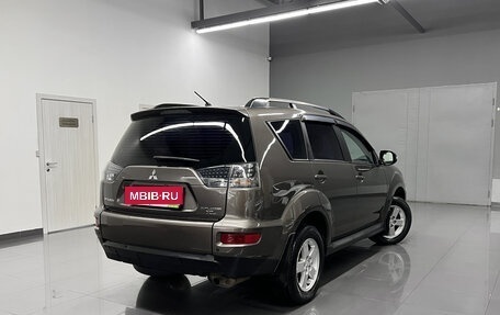 Mitsubishi Outlander III рестайлинг 3, 2010 год, 1 075 000 рублей, 2 фотография