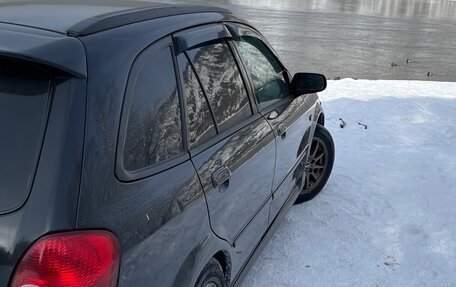 Mazda Familia, 2002 год, 450 000 рублей, 2 фотография