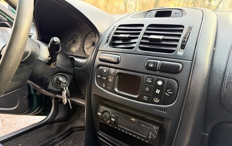 Mitsubishi Carisma I, 1998 год, 198 000 рублей, 17 фотография