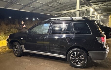 Mitsubishi Outlander III рестайлинг 3, 2004 год, 720 000 рублей, 3 фотография