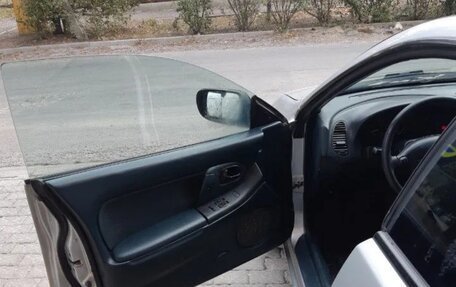 Mazda 323, 1996 год, 110 000 рублей, 4 фотография