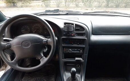 Mazda 323, 1996 год, 110 000 рублей, 2 фотография