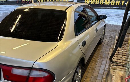 Mazda Familia, 1997 год, 290 000 рублей, 11 фотография