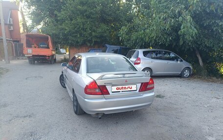 Mitsubishi Mirage VI рестайлинг, 1998 год, 200 000 рублей, 5 фотография