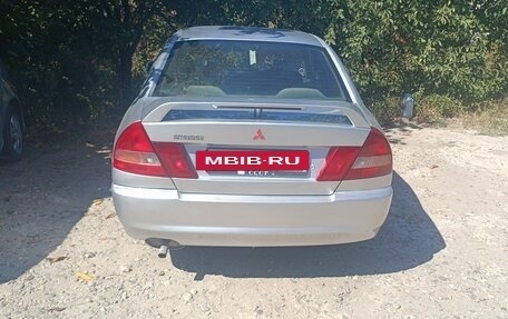 Mitsubishi Mirage VI рестайлинг, 1998 год, 200 000 рублей, 2 фотография