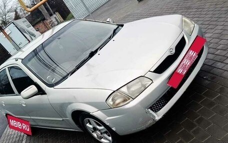 Mazda Familia, 1998 год, 160 000 рублей, 1 фотография