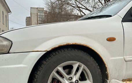 Mazda Familia, 2000 год, 330 000 рублей, 12 фотография