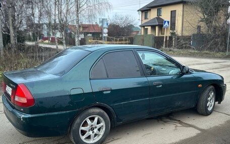 Mitsubishi Lancer VII, 1996 год, 165 000 рублей, 5 фотография