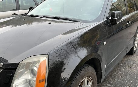 Cadillac SRX II рестайлинг, 2007 год, 900 000 рублей, 3 фотография