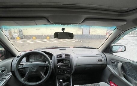 Mazda 323, 1998 год, 210 000 рублей, 10 фотография