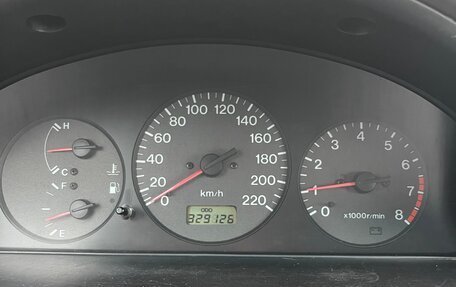 Mazda 323, 1998 год, 210 000 рублей, 11 фотография