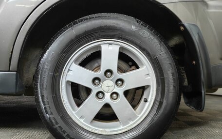 Mitsubishi Outlander III рестайлинг 3, 2011 год, 879 000 рублей, 15 фотография