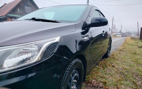 KIA Rio III рестайлинг, 2012 год, 590 000 рублей, 3 фотография