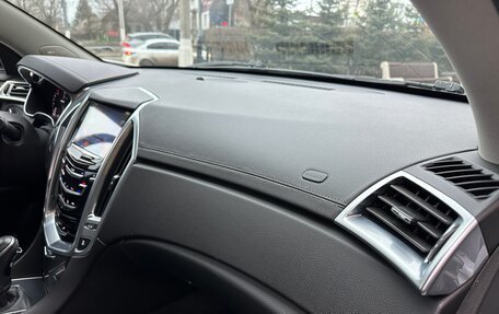 Cadillac SRX II рестайлинг, 2014 год, 1 750 000 рублей, 23 фотография